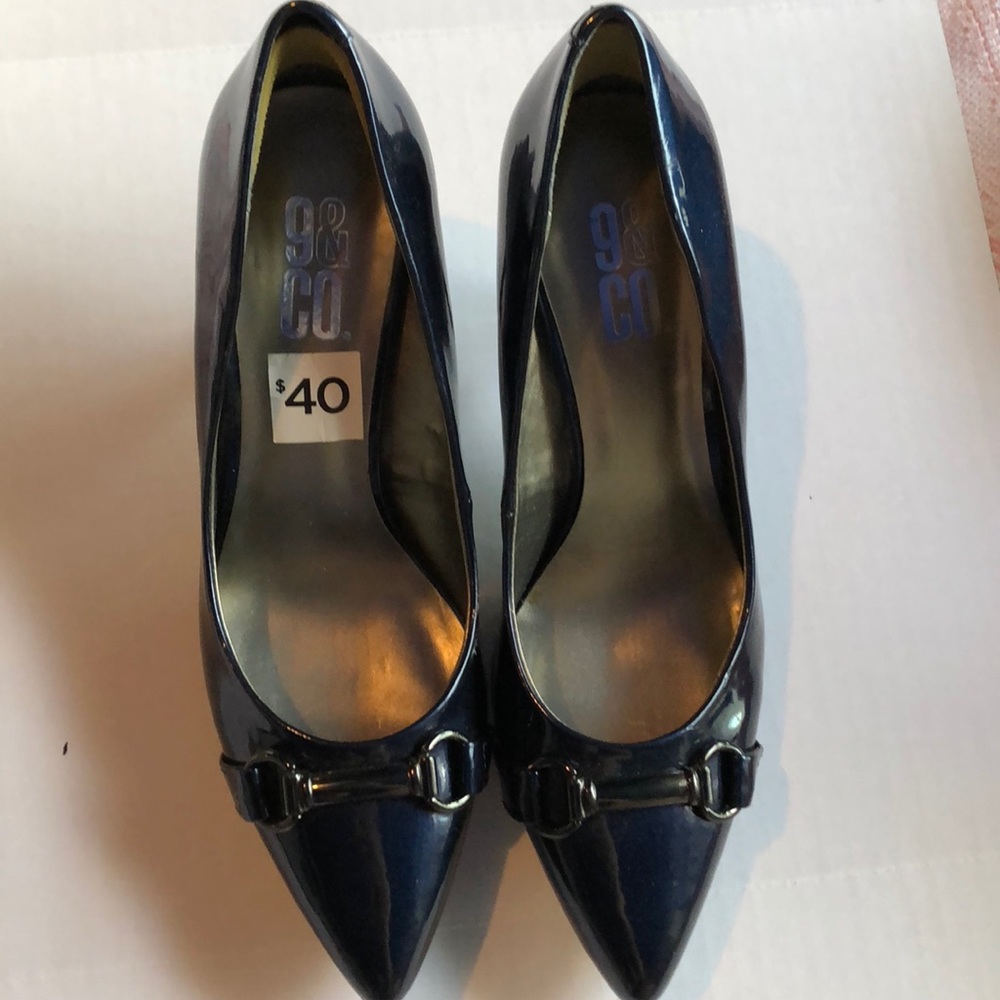 Shiny dark blue heels